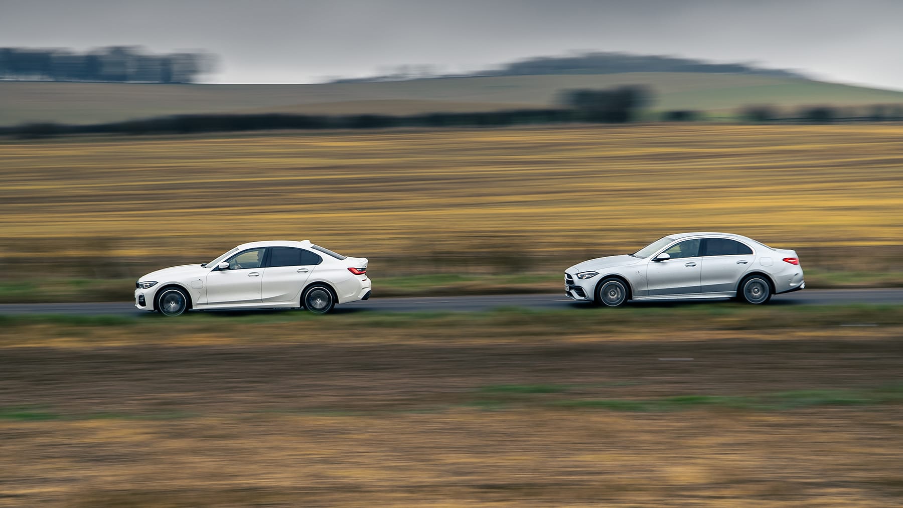 German hybrid saloon showdown: Mercedes C300e vs BMW 330e | Top Gear